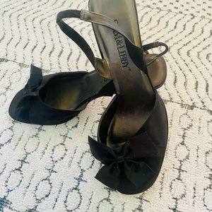 Black satin 4”squared heel with open toed with bow. Gently worn only 1 time